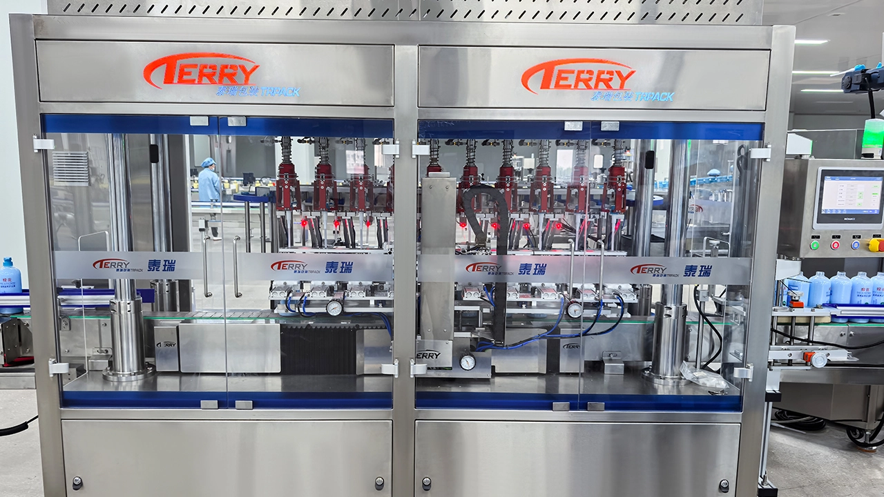 Six-Head Gear Pump Filling Machine, Ten-Head Continuous Cap-Securing Machine, Case Packer, Sealing Machine, Box Labeling Machine, Robot Palletizing Machine Project Site (5)